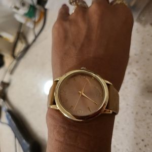 Tan Singapore MOVT women's watch.